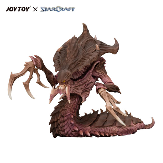 A detailed collectible figure of a reptilian monster from StarCraft, shown on a plain white background with the JOYTOY x StarCraft logo in the top-left corner.