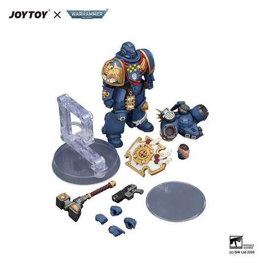 Toy figure with accessories on a white background, featuring JOYTOY and Warhammer branding.