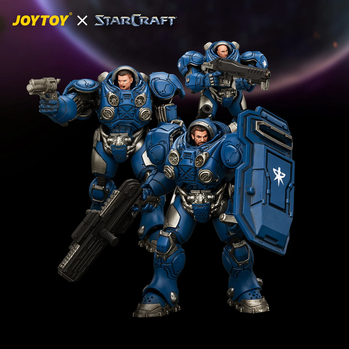 A JOYTOY x StarCraft collectible figure set featuring three blue Space Marine armor models with silver details, weapons, and a shield, set against a dark space-themed background with the JOYTOY x StarCraft logo in the top left.