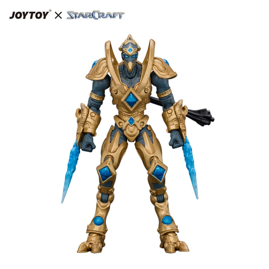 A collectible action figure of a StarCraft warrior in ornate gold armor with blue accents, holding two blue energy blades, shown on a white background with JOYTOY x STARCRAFT branding at the top.