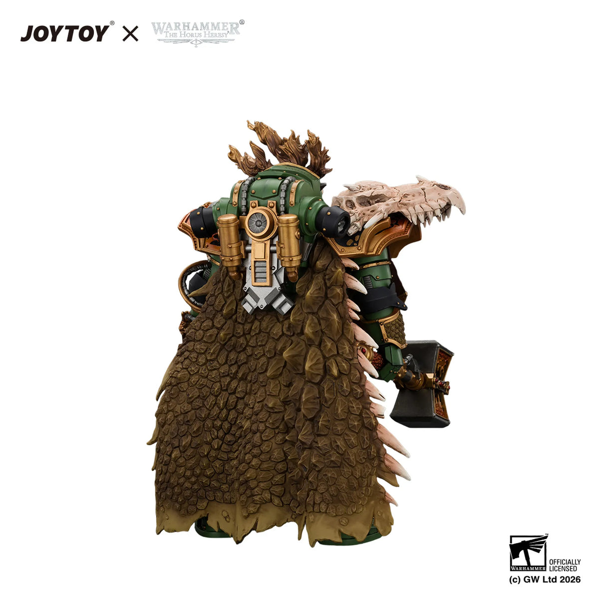 Warhammer 40k JOYTOY x Officially Licensed Design by Games figure of a heavily armored Space Marine from behind, wearing green and gold armor with a large brown scaly cloak and holding a skull weapon, on a white background.