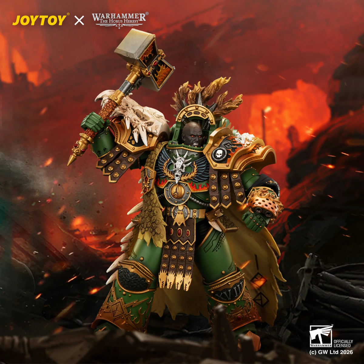 A detailed collectible figure of a Warhammer 40k Space Marine warrior with a skull helmet, green and gold armor, and a large hammer, posed in a fiery, battle-scene background. Visible logos include JOYTOY, Warhammer 40k, and Special Effects Figures.