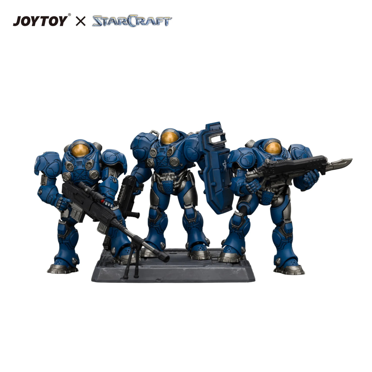 Three blue StarCraft Warframe action figures with gold visors and black weapons, posed on a black base against a white background, with JOYTOY x STARCRAFT branding at the top.