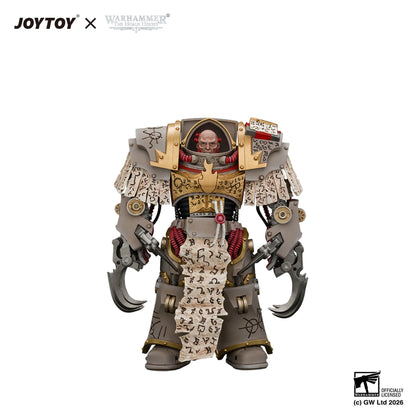 A detailed collectible figure of a Warhammer 40k Space Marine in ornate power armor, featuring a skull helmet, clawed gauntlets, and a scroll of runes, shown against a plain white background with JOYTOY and Warhammer branding.