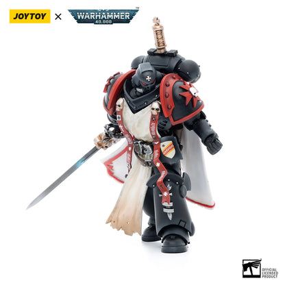 Toy figure with black and red armor holding a sword, branded with Joytoy and Warhammer 40,000 logos.