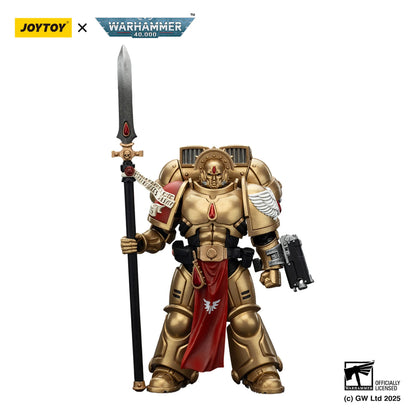 Warhammer figurine with gold armor and red cape holding a sword, branded with JoyToy and Warhammer logos.