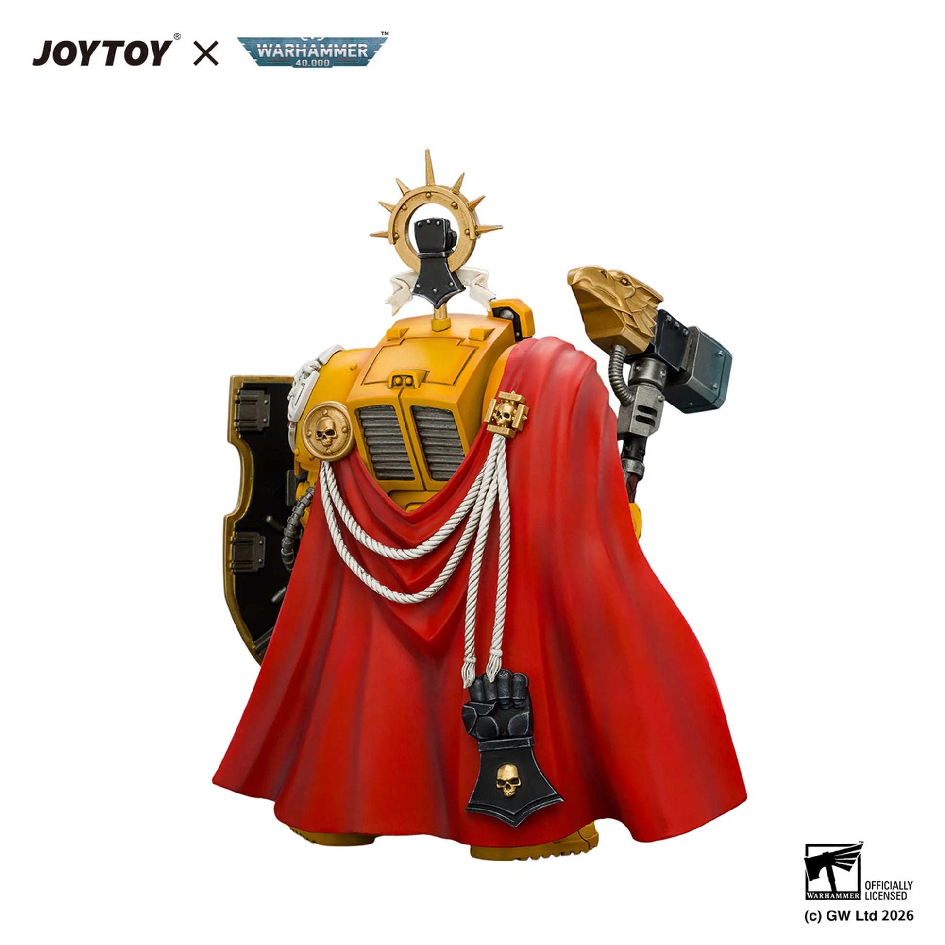 A detailed collectible figurine of a Warhammer 40k Space Marine with a red cape, gold armor, and a skull-crowned helmet, shown on a white background with JOYTOY and Warhammer 40k branding.