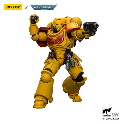 Toy figure in yellow armor with a gun, branded with Joytoy and Warhammer, on a white background.