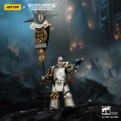 Toy figure of a warrior with a banner, likely from the Warhammer series, against a dark, smoky background.