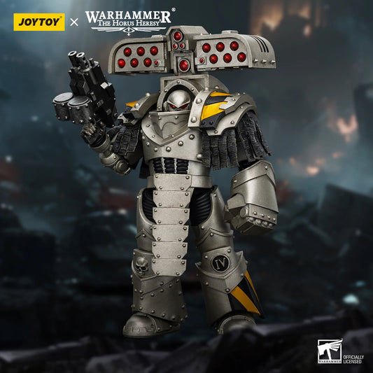 Toy figure of a robot with JOYTOY and Warhammer branding on a dark background
