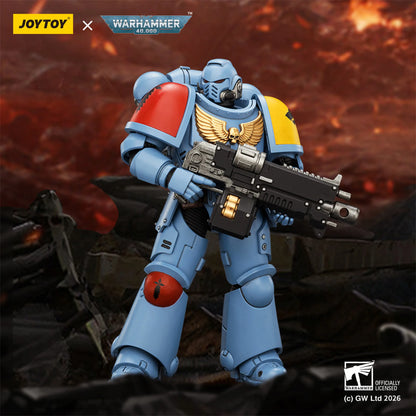 Toy figure of a warrior in blue armor with a weapon, branded as Joytoy x Warhammer, against a fiery background.
