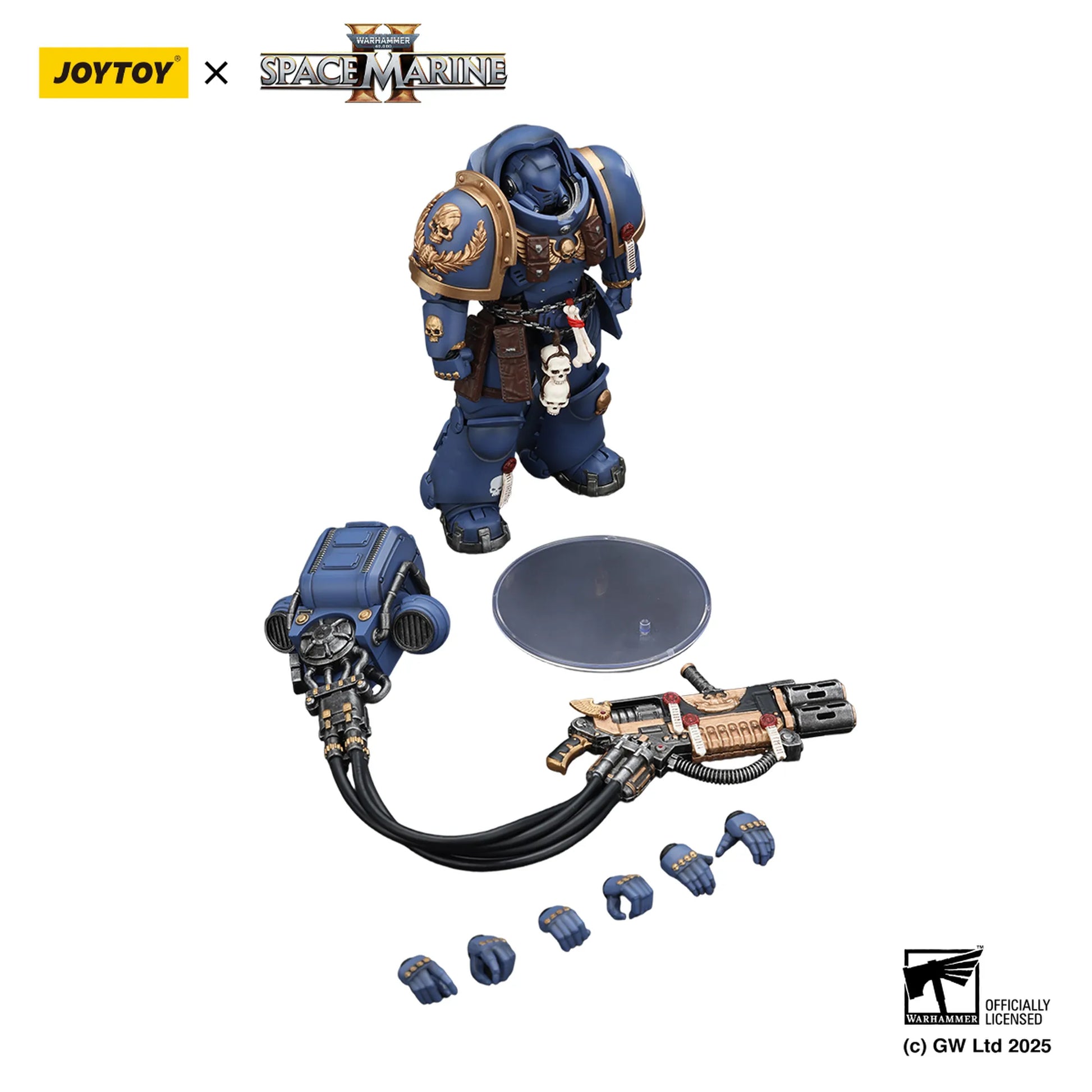 Toy figure of a Space Marine with accessories on a white background, featuring Joytoy and Games Workshop logos.