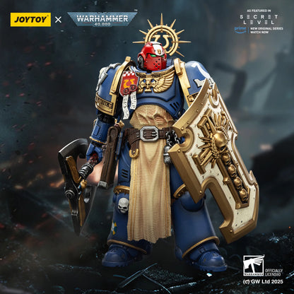 Warhammer 40,000 figurine with Joytoy branding on a dark background
