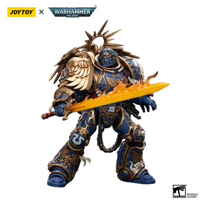 Toy figure with ornate design and sword, branded with Joytoy and Warhammer.